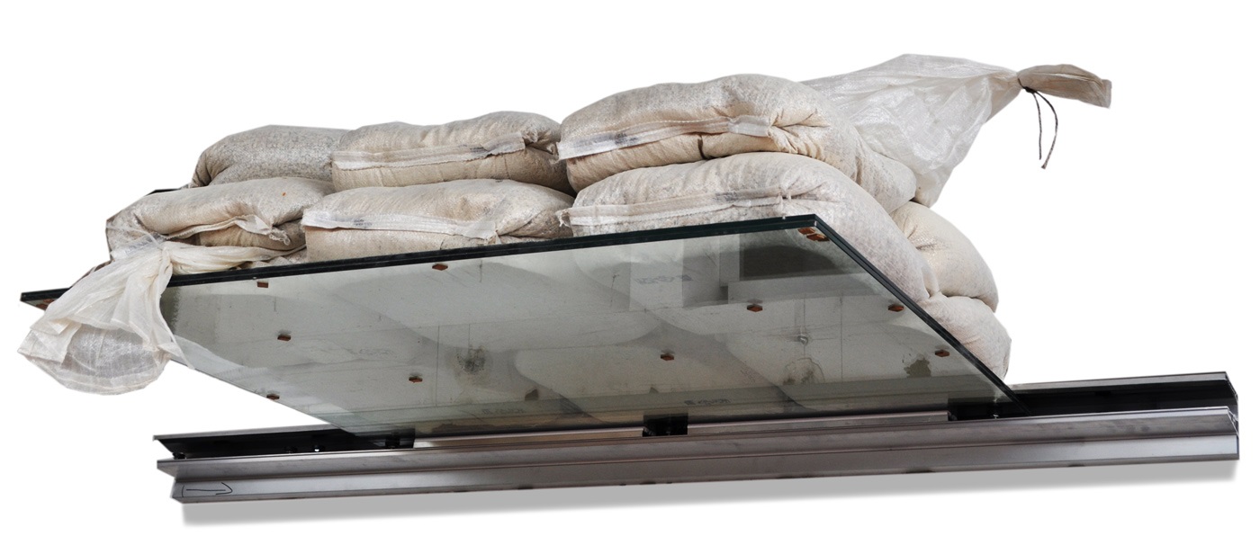 test di portata pensilina in vetro