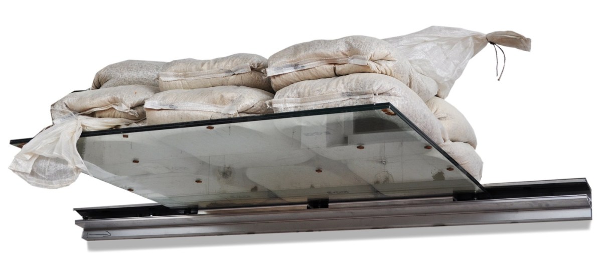 test di portata pensilina in vetro