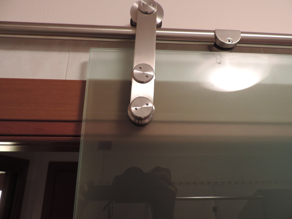 meccanismo porta scorrevole in vetro